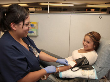 Student donating blood