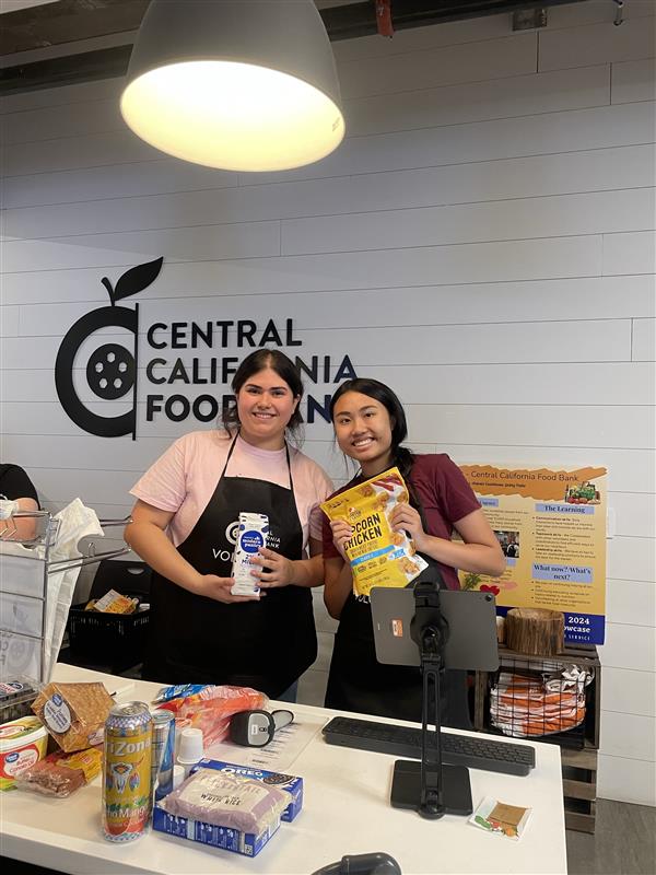 food bank volunteers with food packing items
