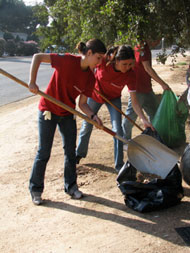 Students cleaning up a trail.