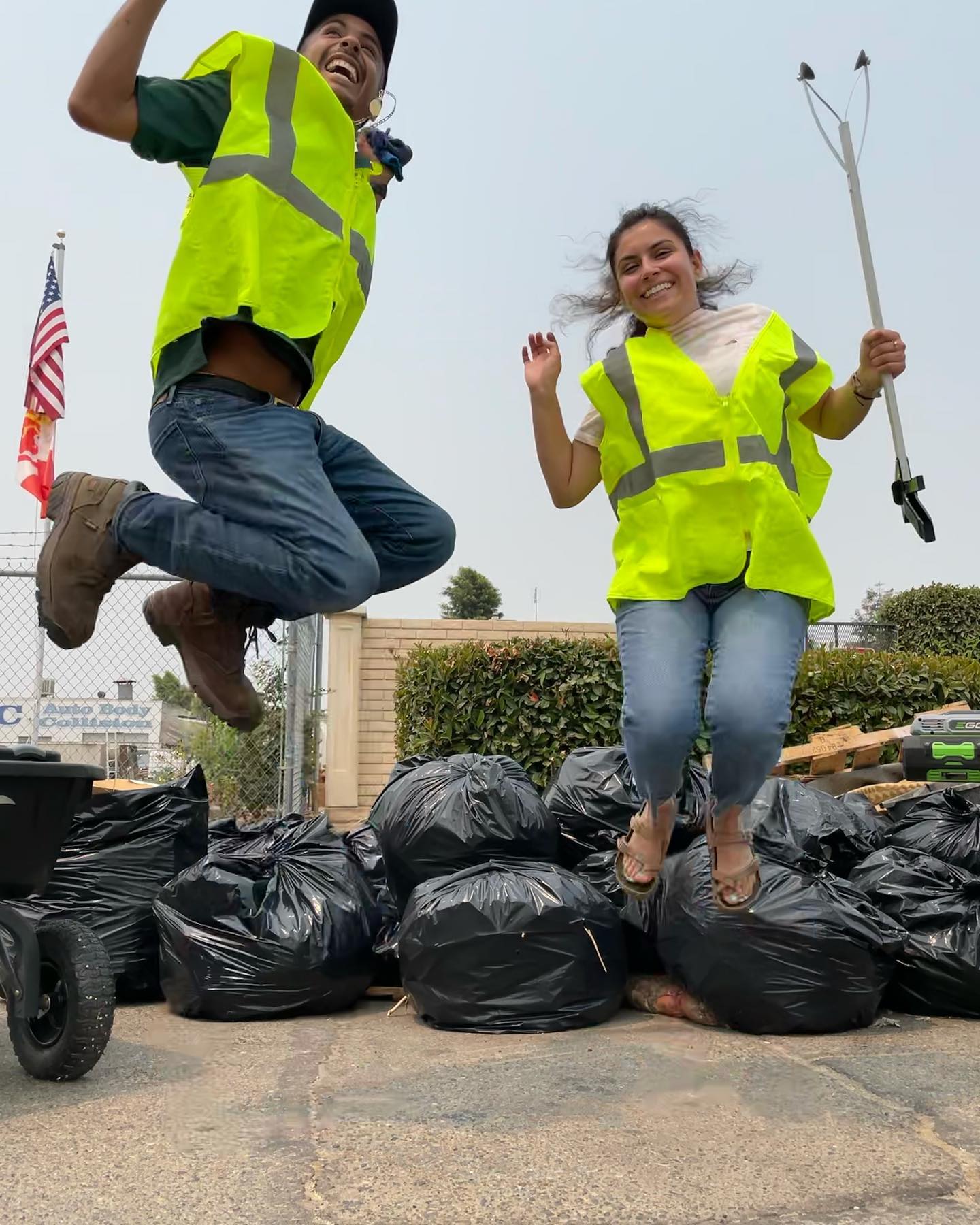 Students volunteering with trash clean up