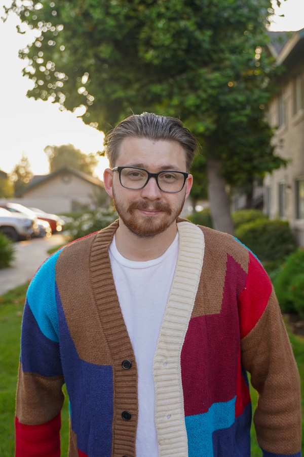 outdoor photo of Jeff in a colorful sweather