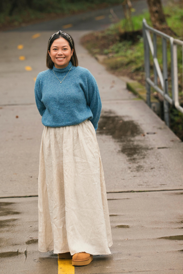 an outdoor photo of Karen standing on a path