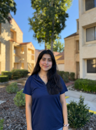 Paulina Avila Paulina Avila - outside in front of some buildings