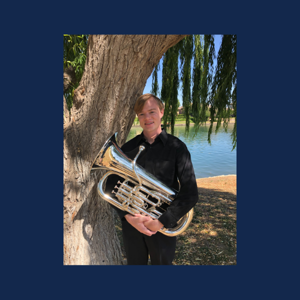BRANDON HATCH - outside photo with musical instrument
