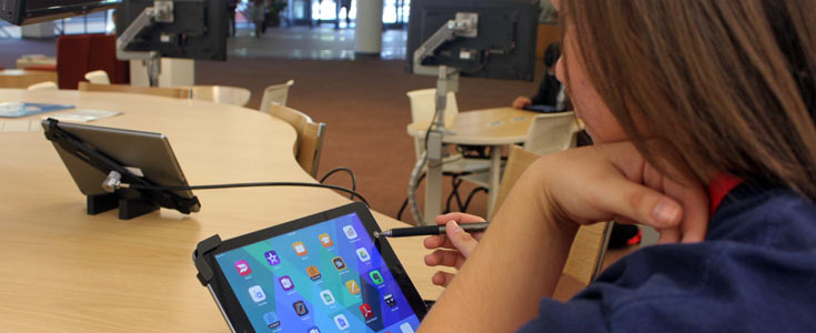 student using iPad