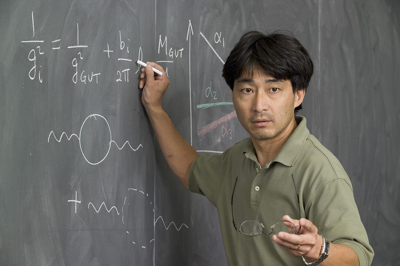Instructor presenting mathematics on a chalkboard