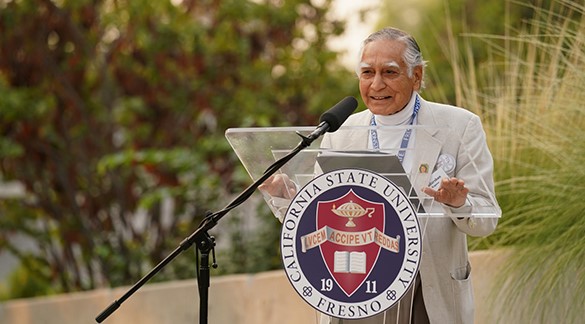 Dr. Kapoor giving outdoor speech at Fresno State