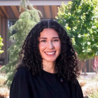 Headshot of Mia Zamora.