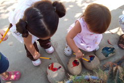 Children painting rocks