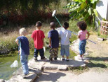 Kids playing near pond